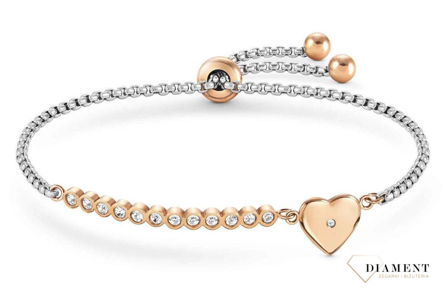 Bransoletka Nomination Italy z kolekcji Milleluci. Wykonana ze stali szlachetnej, zdobiona mieniącymi się, błyszczącymi cyrkoniami oraz zawieszką w kształcie serca w kolorze różowego złota..jpg